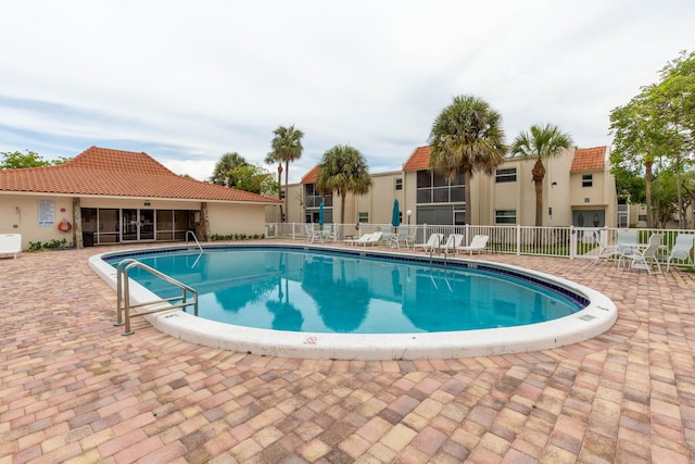 1428 SE 4th Ave Unit 127, Deerfield Beach, FL 33441 - community pool featuring a patio area