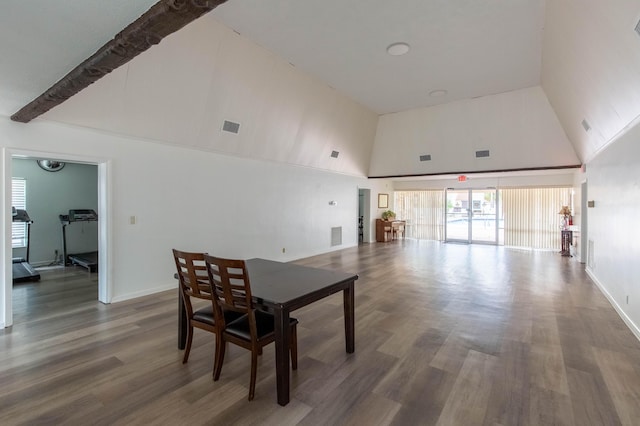 1428 SE 4th Ave Unit 127, Deerfield Beach, FL 33441 - dining space featuring high vaulted ceiling and wood finished floors