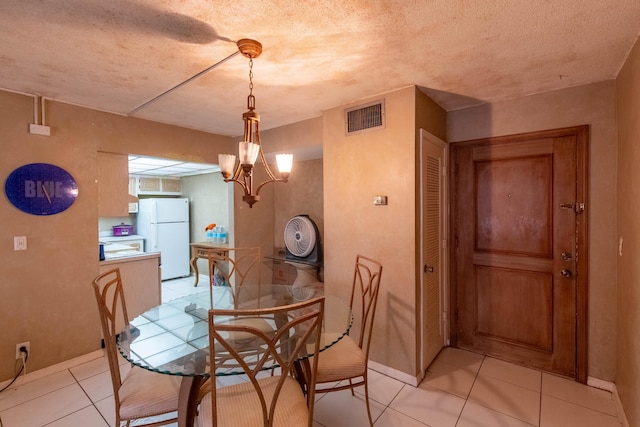 1428 SE 4th Ave Unit 127, Deerfield Beach, FL 33441 - dining space with light tile patterned flooring