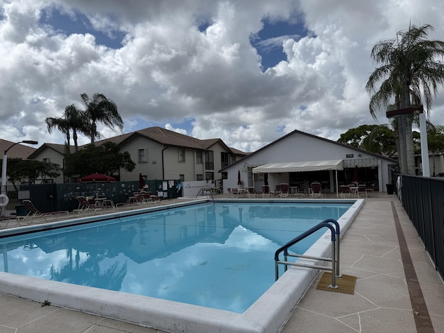 4760 Lucerne Lakes Blvd Unit 206, Lake Worth, FL 33467 - community pool featuring a patio