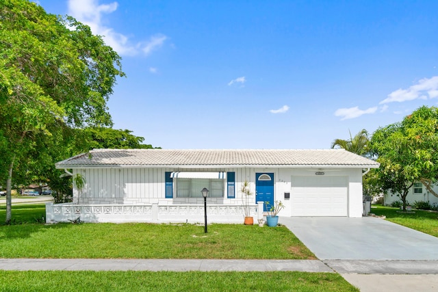 2203 Campanelli Blvd, Boynton Beach, FL 33426 - single story home with an attached garage, a tiled roof, and a front lawn