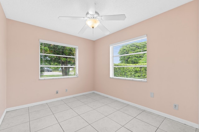 2203 Campanelli Blvd, Boynton Beach, FL 33426 - spare room featuring light tile patterned floors and ceiling fan