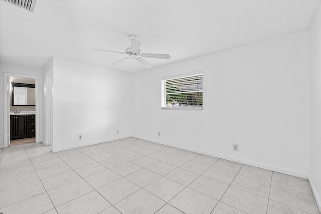 2203 Campanelli Blvd, Boynton Beach, FL 33426 - spare room featuring light tile patterned flooring and ceiling fan