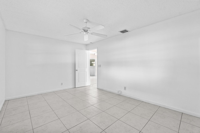 2203 Campanelli Blvd, Boynton Beach, FL 33426 - unfurnished room with ceiling fan, a textured ceiling, and light tile patterned flooring