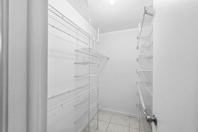 2203 Campanelli Blvd, Boynton Beach, FL 33426 - walk in closet with light tile patterned flooring