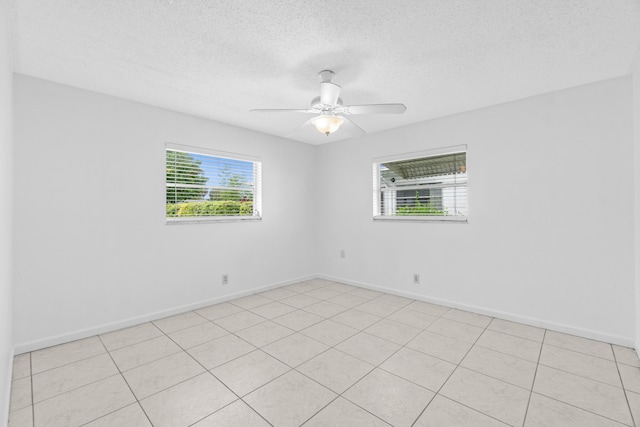 2203 Campanelli Blvd, Boynton Beach, FL 33426 - empty room featuring a textured ceiling, ceiling fan, and light tile patterned floors