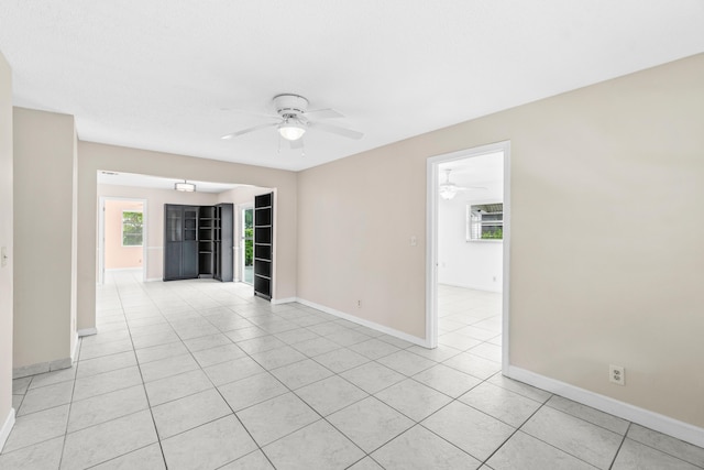 2203 Campanelli Blvd, Boynton Beach, FL 33426 - empty room with ceiling fan and light tile patterned flooring