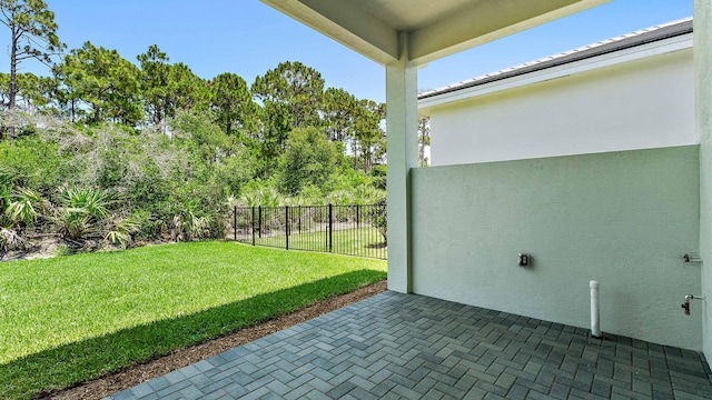 212 SE Via Sangro, Port Saint Lucie, FL 34952 - view of yard featuring a patio