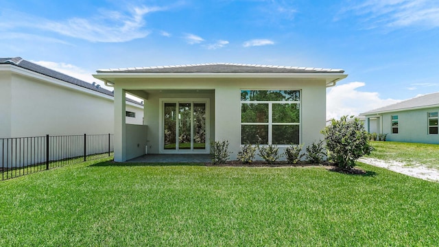 212 SE Via Sangro, Port Saint Lucie, FL 34952 - back of house featuring stucco siding