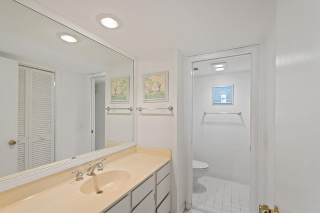 120 Lakeshore Dr Unit 735, North Palm Beach, FL 33408 - bathroom featuring a closet, vanity, and tile patterned floors