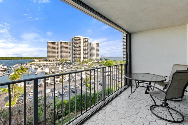 120 Lakeshore Dr Unit 735, North Palm Beach, FL 33408 - balcony with a water view and view of marina