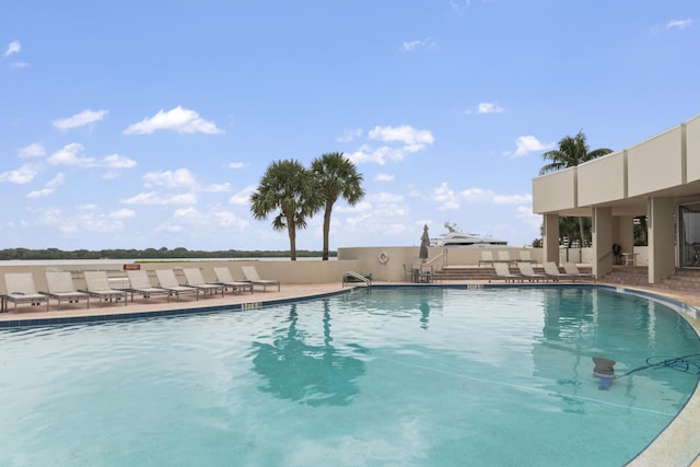 120 Lakeshore Dr Unit 735, North Palm Beach, FL 33408 - community pool with a patio