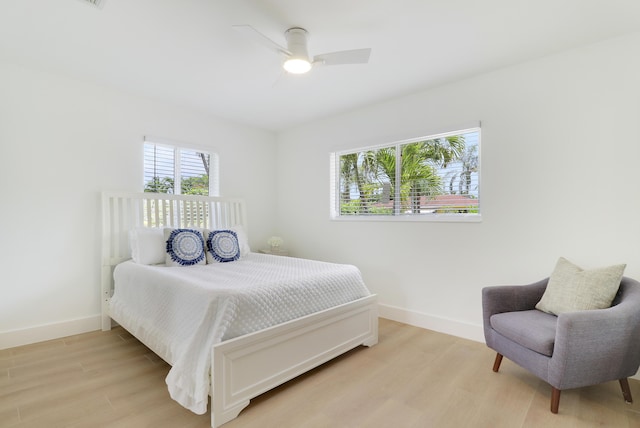 1893 Circle Dr, North Palm Beach, FL 33408 - bedroom featuring light wood-type flooring and ceiling fan