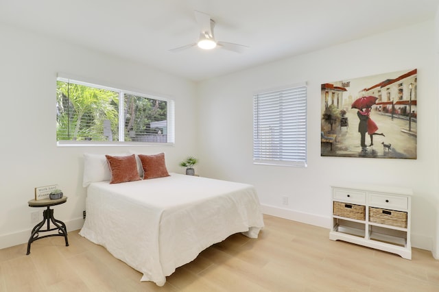 1893 Circle Dr, North Palm Beach, FL 33408 - bedroom with light wood-style floors and a ceiling fan