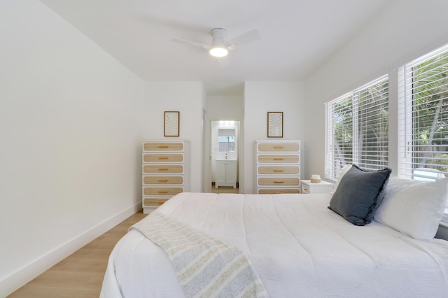 1893 Circle Dr, North Palm Beach, FL 33408 - bedroom with light wood finished floors and a ceiling fan