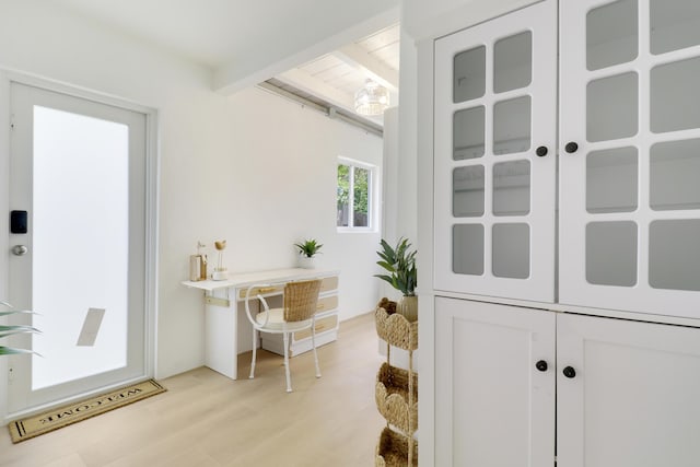 1893 Circle Dr, North Palm Beach, FL 33408 - interior space featuring beamed ceiling and light wood-style floors