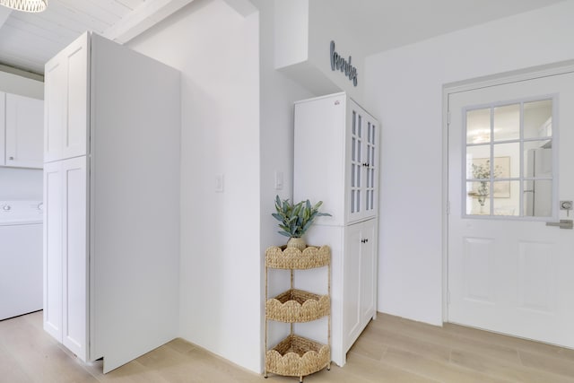 1893 Circle Dr, North Palm Beach, FL 33408 - doorway with washer / clothes dryer and light wood finished floors
