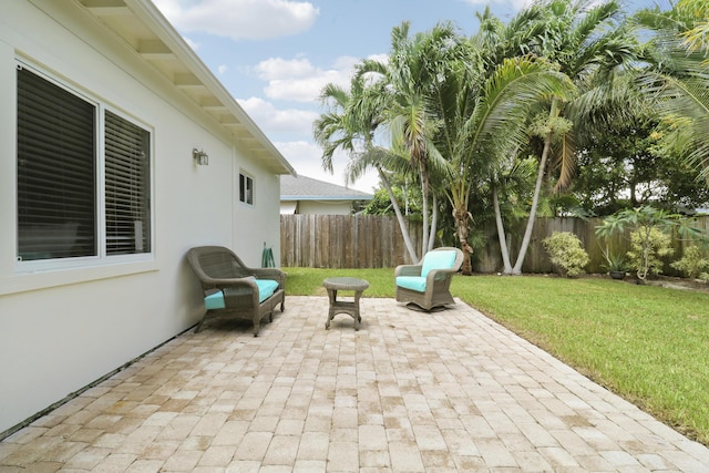 1893 Circle Dr, North Palm Beach, FL 33408 - fenced backyard with a patio area