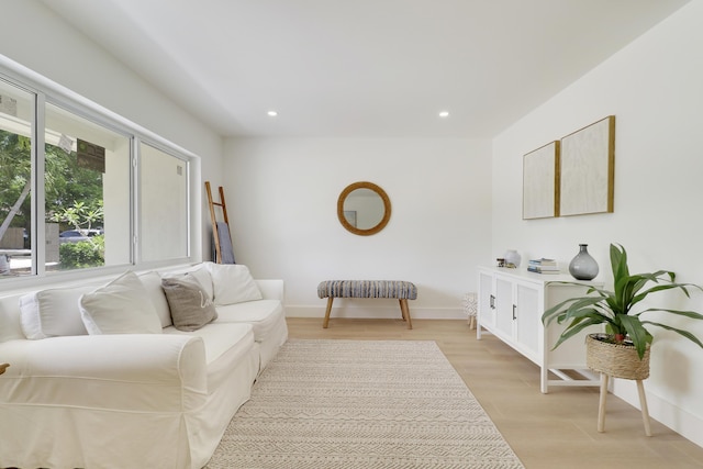 1893 Circle Dr, North Palm Beach, FL 33408 - living room with light wood finished floors and recessed lighting