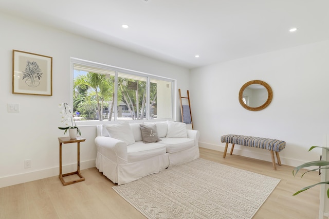 1893 Circle Dr, North Palm Beach, FL 33408 - living area featuring light wood finished floors and recessed lighting