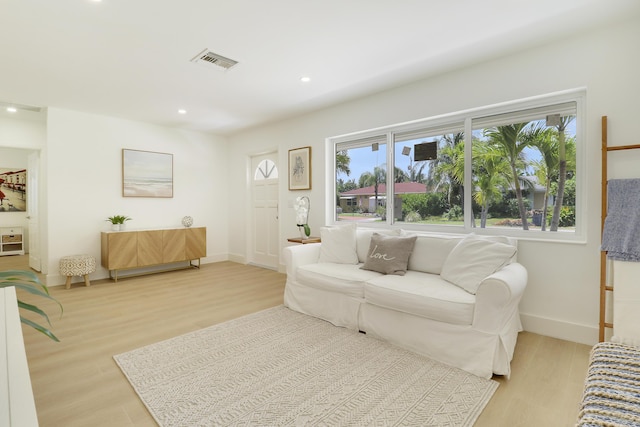 1893 Circle Dr, North Palm Beach, FL 33408 - living area featuring light wood-style flooring and recessed lighting
