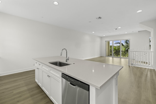 5143 Beckman Ter, Palm Beach Gardens, FL 33418 - kitchen with dishwasher, recessed lighting, wood finished floors, light countertops, and white cabinetry