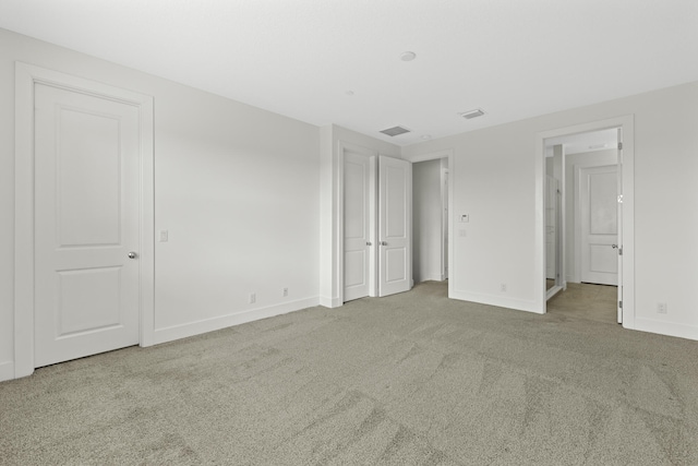 5143 Beckman Ter, Palm Beach Gardens, FL 33418 - unfurnished bedroom featuring carpet flooring and baseboards
