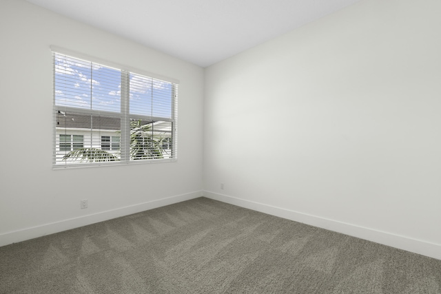 5143 Beckman Ter, Palm Beach Gardens, FL 33418 - carpeted spare room with baseboards