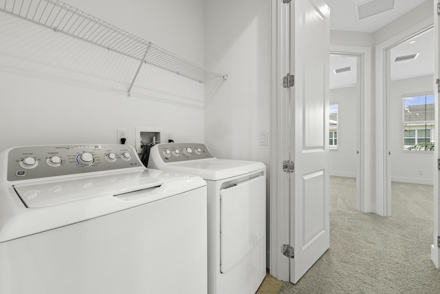 5143 Beckman Ter, Palm Beach Gardens, FL 33418 - washroom with washer and dryer and light colored carpet