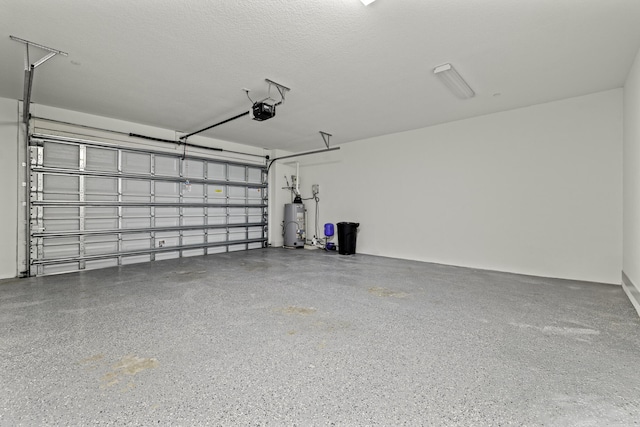 5143 Beckman Ter, Palm Beach Gardens, FL 33418 - garage featuring a garage door opener and water heater