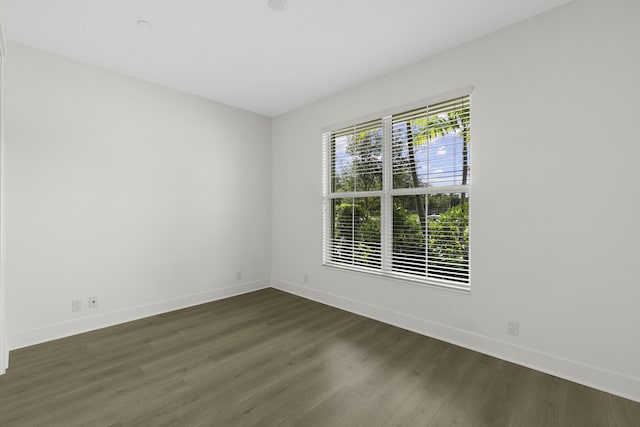 5143 Beckman Ter, Palm Beach Gardens, FL 33418 - unfurnished room featuring baseboards and dark wood-type flooring