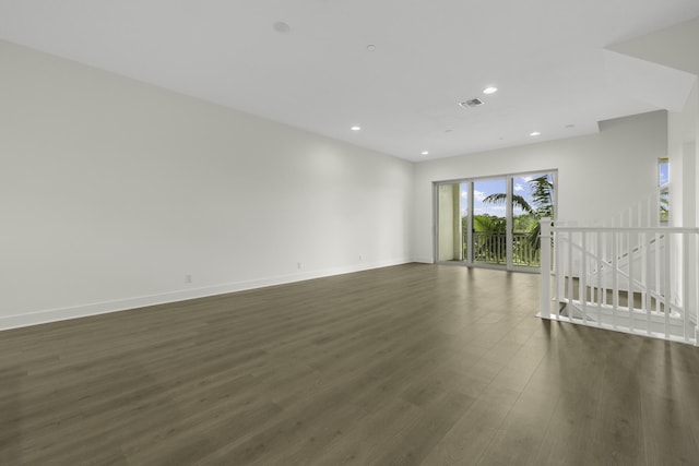 5143 Beckman Ter, Palm Beach Gardens, FL 33418 - spare room featuring dark wood-type flooring and recessed lighting