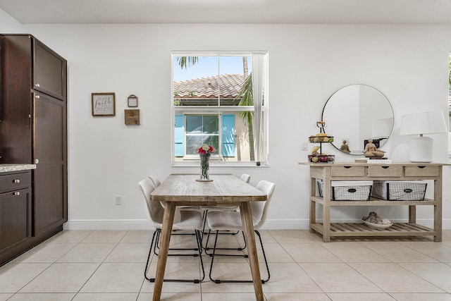 8274 Cascada Isles Dr, Cooper City, FL 33024 - dining room featuring light tile patterned floors and baseboards