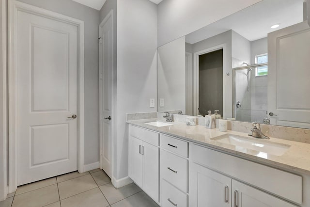 521 SE Plumeria Dr, Port Saint Lucie, FL 34984 - bathroom with a stall shower, tile patterned flooring, and double vanity