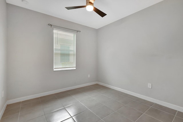 521 SE Plumeria Dr, Port Saint Lucie, FL 34984 - unfurnished room with ceiling fan and tile patterned flooring
