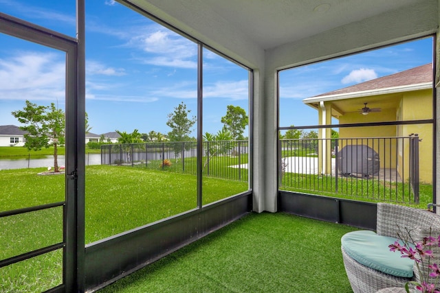 521 SE Plumeria Dr, Port Saint Lucie, FL 34984 - sunroom / solarium with a water view and a ceiling fan