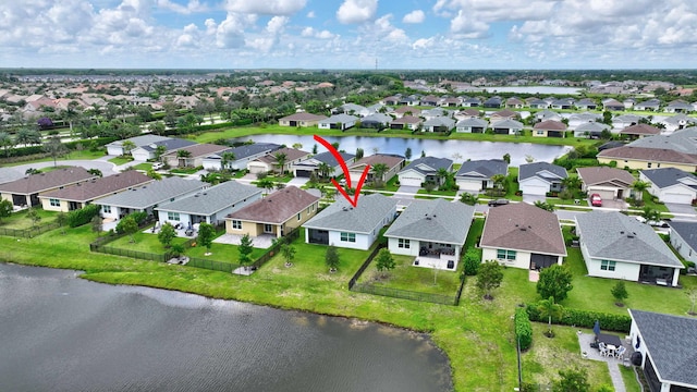 521 SE Plumeria Dr, Port Saint Lucie, FL 34984 - view of property location with a large body of water and nearby suburban area
