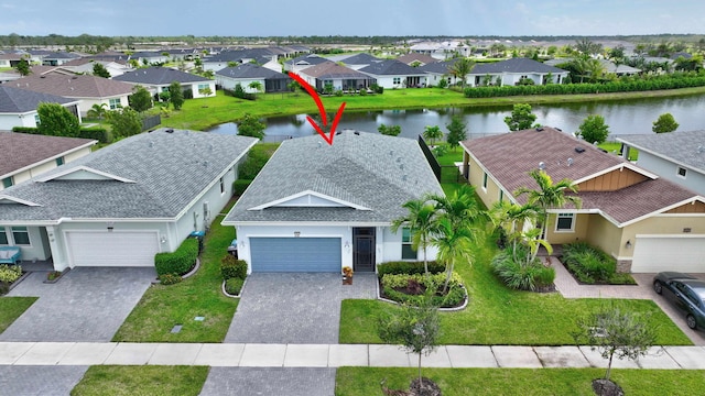521 SE Plumeria Dr, Port Saint Lucie, FL 34984 - aerial view of residential area featuring a nearby body of water