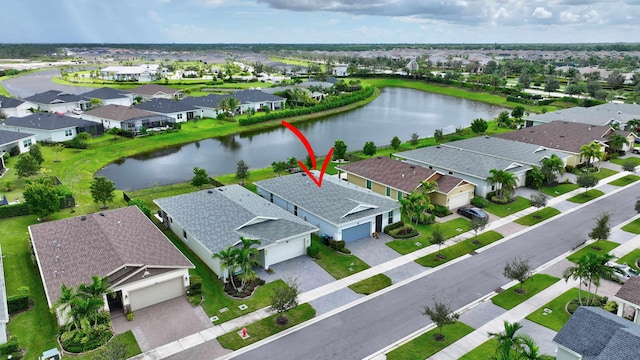 521 SE Plumeria Dr, Port Saint Lucie, FL 34984 - aerial perspective of suburban area featuring a nearby body of water