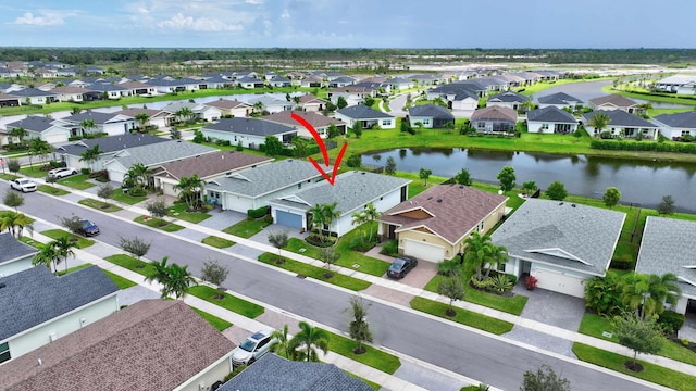 521 SE Plumeria Dr, Port Saint Lucie, FL 34984 - aerial view of residential area with a nearby body of water