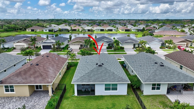 521 SE Plumeria Dr, Port Saint Lucie, FL 34984 - aerial view of residential area featuring a nearby body of water