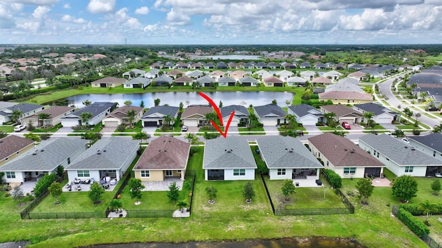 521 SE Plumeria Dr, Port Saint Lucie, FL 34984 - aerial view of property's location featuring nearby suburban area and a large body of water