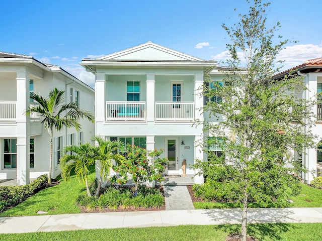 13496 Bernoulli Way, Palm Beach Gardens, FL 33418 - view of front facade featuring a balcony and stucco siding