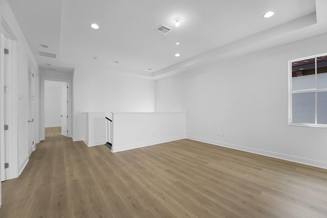 13496 Bernoulli Way, Palm Beach Gardens, FL 33418 - unfurnished room with wood finished floors and recessed lighting