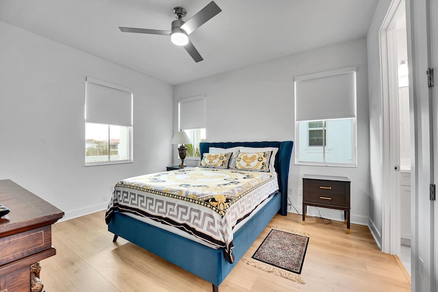 13496 Bernoulli Way, Palm Beach Gardens, FL 33418 - bedroom with light wood-type flooring and ceiling fan