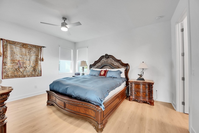 13496 Bernoulli Way, Palm Beach Gardens, FL 33418 - bedroom with light wood-style flooring and a ceiling fan