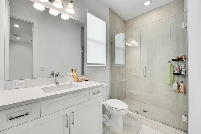 13496 Bernoulli Way, Palm Beach Gardens, FL 33418 - bathroom featuring vanity, recessed lighting, a shower stall, and tile patterned floors