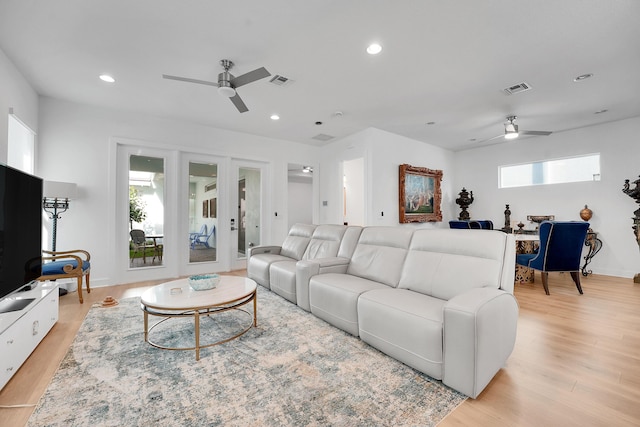 13496 Bernoulli Way, Palm Beach Gardens, FL 33418 - living room featuring ceiling fan, healthy amount of natural light, light wood-type flooring, and recessed lighting