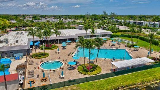 313 Saxony Unit G, Delray Beach, FL 33446 - drone / aerial view of a pool