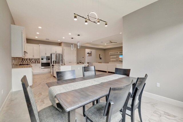 11535 SW Surf Springs Rd, Port Saint Lucie, FL 34987 - dining space with baseboards